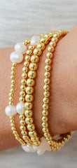 Bracelet classique extensible en perles dorées de 4 mm