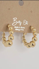Boucles d'oreilles créoles à boule