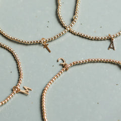 enewton classic gold 2mm bracelet - respect gold initial charm