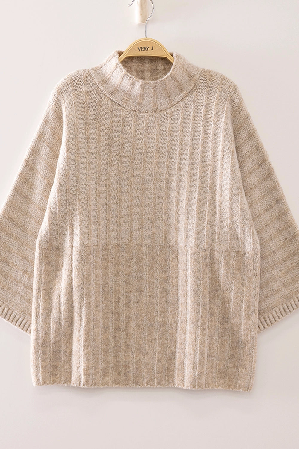 Qually Sweater